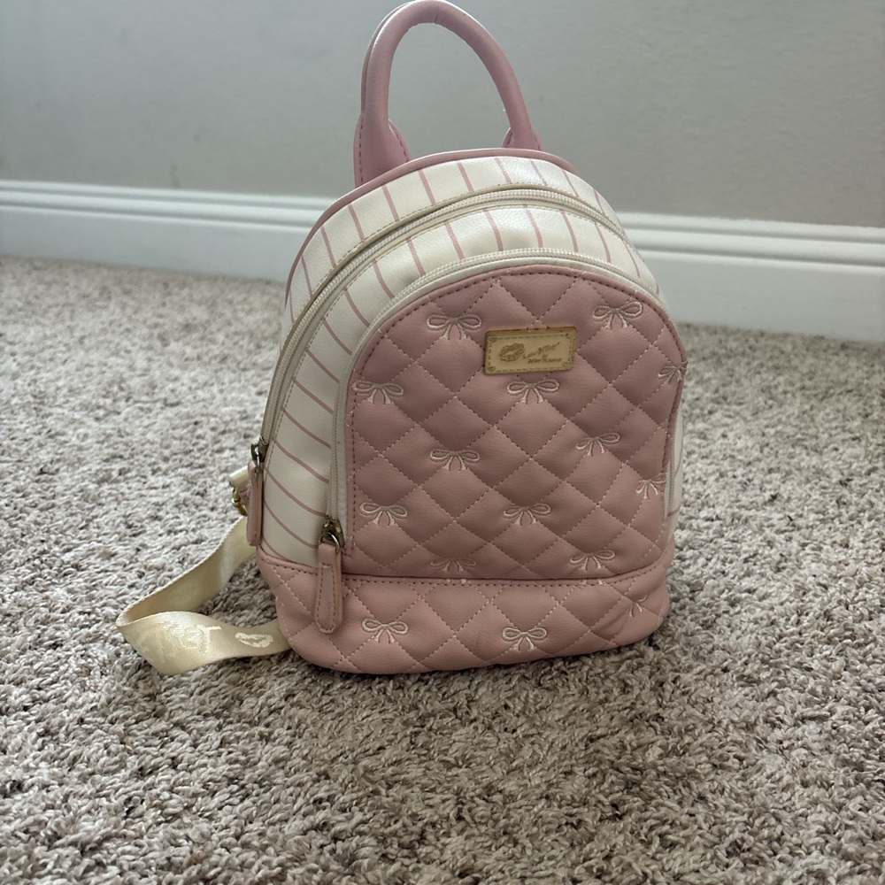 Chic Pink Quilted Backpack